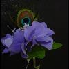 Floralisa peacock boutonniere