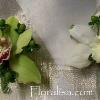 Floralisa cymbidium orchid & berries boutonniere