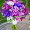 Floralisa purple rose, dahlia orchid bouquet.
Photo: Larsen's Photography